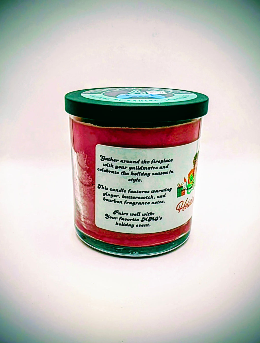 A 9 oz. candle in a glass tumbler jar named "Holiday Hearth". The label features a festive gathering of orcs around a fireplace during the holiday season.