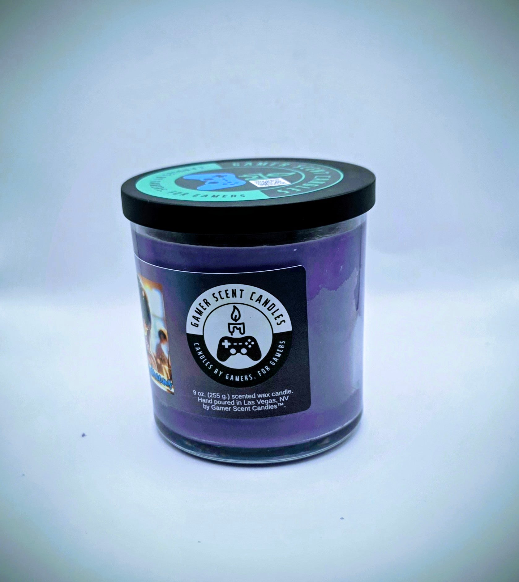 Our "Japanese Daydreams" candle in a 9 oz. glass tumbler jar. The candle features Sakura (cherry blossom) and plum fragrance notes. The candle is purple and features a purple label with a young Japanese girl wearing headphones, daydreaming during class. Our 9 oz. candles have approximately a 40 hour burn time.