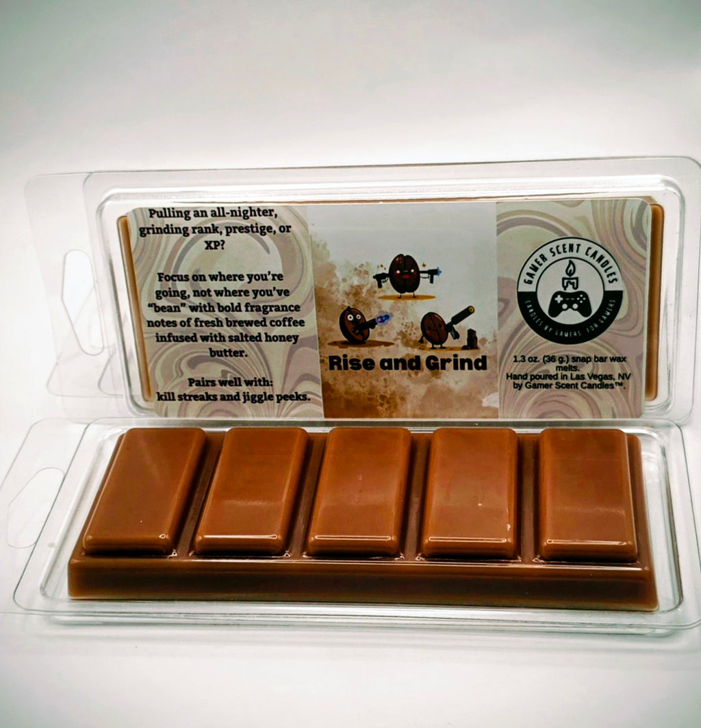 Our "Rise and Grind" scent in a 1.3 snap bar wax melt. It features fragrance notes of fresh brewed coffee, infused with scented honey butter. The label features cartoon coffee beans with weapons.