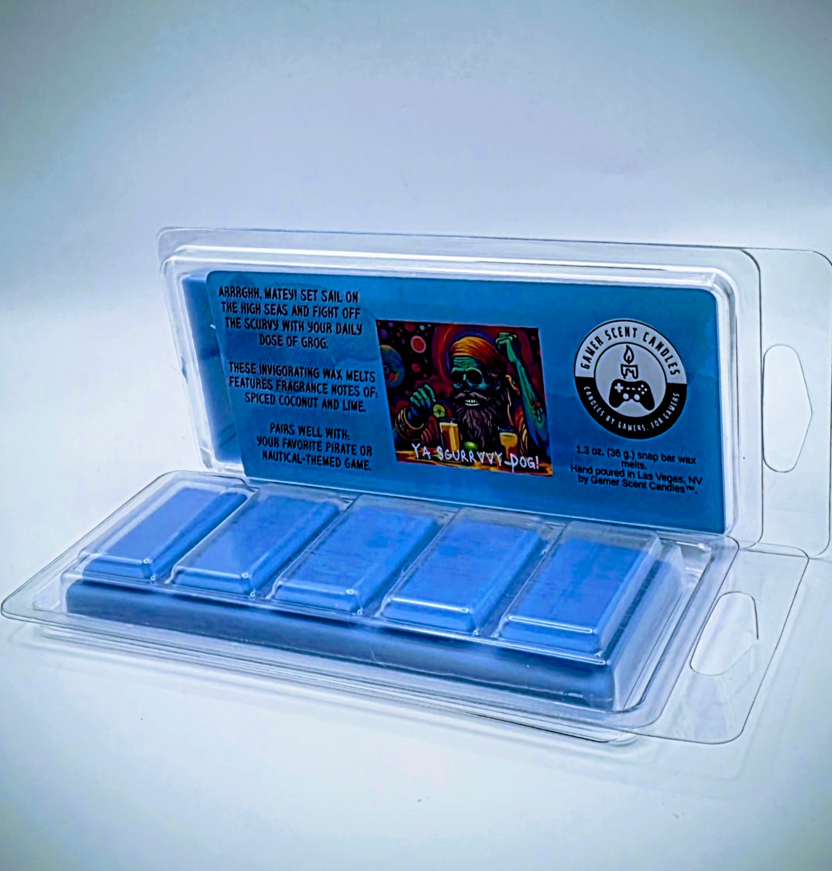 Our "Scurvy Dog" scent in a snap bar wax melt. It features fragrance notes of spiced coconut and lime. The label features a psychedelic pirate holding a drink garnished with a lime.