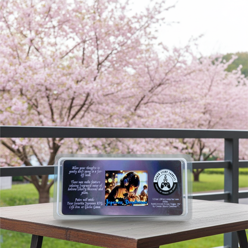 Japanese Daydreams snap-bar wax melts in front of a field of cherry blossoms. Front view. Video game wax melts for JRPG, Japanese life sim, and gacha games. Perfect gift for gamers. Premium soy wax scented wax melts. Wax tarts.